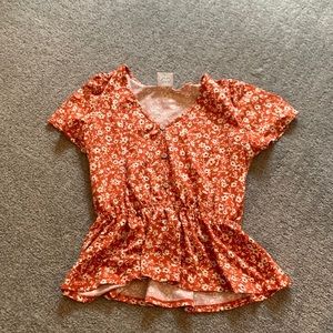 orange floral blouse